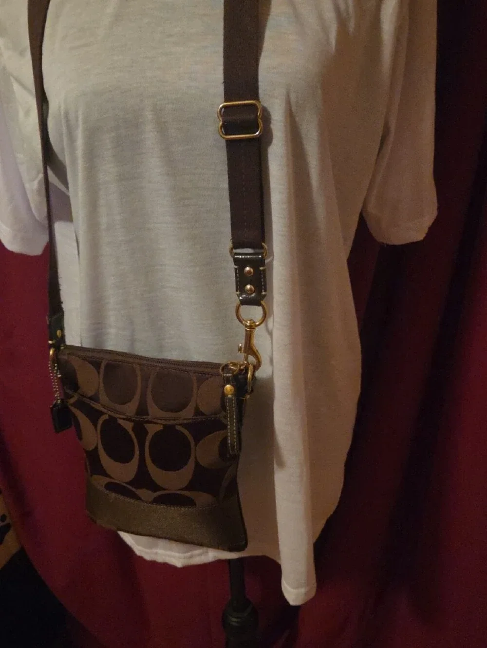 Coach Brown Signature Messenger Crossbody with Gold-Tone Hardware.